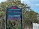 Community sign for Gail D. Helvie Park/Lake Joy/Magic Lake, residents only, set against a backdrop of trees at 331 Oak Lane Dr, Ocala, FL 34472