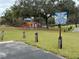 LAKE JOY & MAGIC LAKE playground featuring a slide, play area and mature shade trees at 331 Oak Lane Dr, Ocala, FL 34472