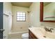 Clean bathroom with a bathtub and updated vanity at 4 Hickory Track Trce, Ocala, FL 34472