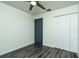 Bedroom with gray laminate flooring and a closet at 4 Hickory Track Trce, Ocala, FL 34472