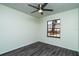 Bedroom with gray laminate flooring and a window at 4 Hickory Track Trce, Ocala, FL 34472