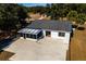 Aerial view of house back, patio, and yard at 4 Hickory Track Trce, Ocala, FL 34472