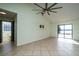 Spacious main bedroom with lake views and sliding glass doors at 4 Hickory Track Trce, Ocala, FL 34472