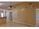 Dining room showing light fixture and view to kitchen and living areas at 404 Cr 487, Lake Panasoffkee, FL 33538