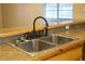 Double stainless steel sink with oil rubbed bronze faucet at 404 Cr 487, Lake Panasoffkee, FL 33538