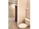 Small bathroom with shower/tub combo and toilet at 4117 Sw 30Th Ct, Ocala, FL 34474