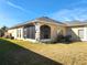 Single-story house with screened porch and well-maintained lawn at 4117 Sw 30Th Ct, Ocala, FL 34474