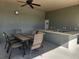 Outdoor kitchen and dining area adjacent to the community pool at 4117 Sw 30Th Ct, Ocala, FL 34474