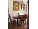 Elegant dining room with hardwood floors and antique dining set at 4360 Se 62Nd St, Ocala, FL 34480