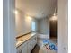 Bathroom with double vanity, granite countertops, bathtub and walk-in shower at 4373 Sw 90Th Pl, Ocala, FL 34476
