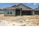 Charming single-story home featuring a stucco exterior, attached garage, and well-defined architectural details at 4373 Sw 90Th Pl, Ocala, FL 34476