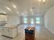 Bright living room with tile floors, granite countertops, and new appliances at 4373 Sw 90Th Pl, Ocala, FL 34476