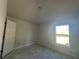 Bright bedroom with a window at 4429 Sw 90Th Pl, Ocala, FL 34476