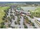 Aerial view of community center, pool, parking, and golf course at 5365 Nw 46Th Lane Rd, Ocala, FL 34482