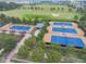 Aerial view of community tennis courts and green space at 5365 Nw 46Th Lane Rd, Ocala, FL 34482