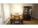 Bright dining room with table, chairs, and a display cabinet at 5465 Ne 12Th Ave, Ocala, FL 34479