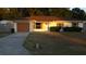 Single story home with attached garage and fenced yard at 5465 Ne 12Th Ave, Ocala, FL 34479