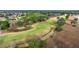 Aerial view showcasing a golf course with a winding path at 6861 Sw 179Th Avenue Rd, Dunnellon, FL 34432