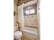 Clean bathroom with shower/tub combo and tile at 6861 Sw 179Th Avenue Rd, Dunnellon, FL 34432