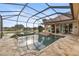 Relaxing screened pool and spa with gorgeous backyard views at 6861 Sw 179Th Avenue Rd, Dunnellon, FL 34432