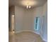 An open-concept dining room with luxury vinyl plank flooring and a chandelier at 7 Nw 45Th Loop, Ocala, FL 34470