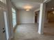 A welcoming entryway with a chandelier and luxury vinyl plank flooring at 7 Nw 45Th Loop, Ocala, FL 34470
