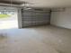 Spacious and clean two-car garage with an automatic door opener, ready for use at 7 Nw 45Th Loop, Ocala, FL 34470