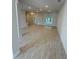 Spacious living room with luxury vinyl plank flooring and ample natural light at 7 Nw 45Th Loop, Ocala, FL 34470