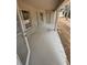 Covered patio with concrete flooring providing an outdoor living space at 7 Nw 45Th Loop, Ocala, FL 34470