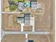 Aerial view showing a home, pool, and airplane near a runway at 7225 Se 92Nd St, Ocala, FL 34472