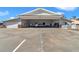 Open hangar with a single-engine airplane inside at 7225 Se 92Nd St, Ocala, FL 34472