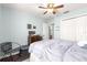 Bright bedroom with a queen bed and calming decor at 8120 Sw 56Th Ter, Ocala, FL 34476