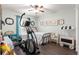 Charming bedroom with twin bed and elliptical at 8120 Sw 56Th Ter, Ocala, FL 34476