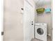 Convenient laundry room with washer, dryer, and storage shelves at 8120 Sw 56Th Ter, Ocala, FL 34476