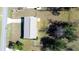 Aerial view of house and backyard with trees at 8274 Sw 106Th Pl, Ocala, FL 34481