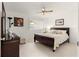 Spacious bedroom with king-size bed and ample closet space at 8785 Sw 91St St # B, Ocala, FL 34481