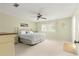 King-size bed in sunny bedroom with lots of natural light at 8785 Sw 91St St # B, Ocala, FL 34481