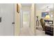 Bright hallway with neutral walls and carpeted floors at 8785 Sw 91St St # B, Ocala, FL 34481