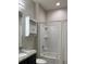 Bathroom featuring granite countertop, shower-tub, and built in storage at 9143 Sw 70Th Loop, Ocala, FL 34481