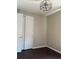 Bedroom with dark wood floors and ceiling fan at 9143 Sw 70Th Loop, Ocala, FL 34481