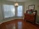 Breakfast nook with light-filled windows, hardwood floors, and traditional furnishings at 9686 Sw 92Nd Place Rd, Ocala, FL 34481