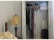 Bedroom closet with clothes and luggage at 10870 Sw 47Th Ct, Ocala, FL 34476