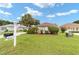 House exterior with mailbox and American flag at 11159 Sw 68Th Ct, Ocala, FL 34476