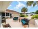 Outdoor patio with seating area and view of neighborhood at 11159 Sw 68Th Ct, Ocala, FL 34476