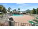 Resort-style pool with surrounding lounge chairs at 11545 Se 175Th St, Summerfield, FL 34491