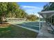 Well-maintained shuffleboard courts with covered seating at 11545 Se 175Th St, Summerfield, FL 34491