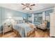 Bright bedroom with a comfortable bed and plenty of natural light at 1314 Noble Ct, Leesburg, FL 34788