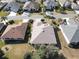 An aerial shot showing a single-story house nestled in a residential community at 13579 Se 89Th Terrace Rd, Summerfield, FL 34491