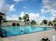 Large rectangular community pool at 13579 Se 89Th Terrace Rd, Summerfield, FL 34491