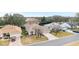 Aerial view of the house and surrounding neighborhood at 1397 Oak Forest Dr, The Villages, FL 32162